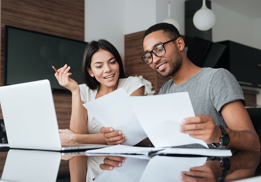 couple working on laptop